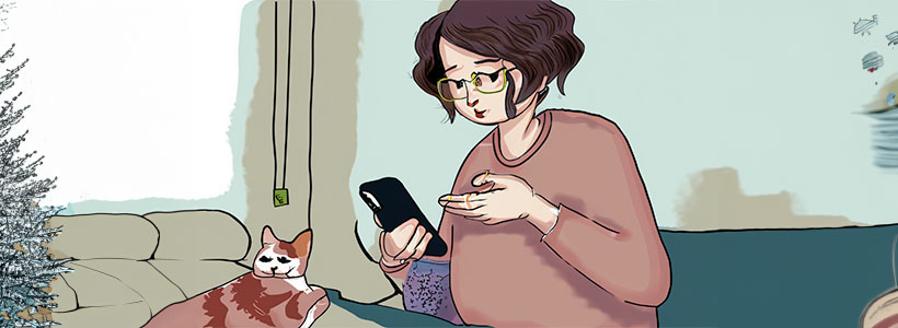 Women with glasses checking her cats symptom on her phone setting her cats next to her